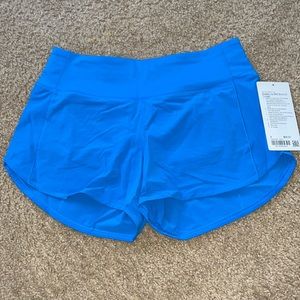 Speed up mid rise 4 inch shorts (color: Poolside)